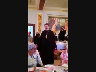 the priest with inspiration performs a hit from the criminal repertoire (pop sings murka)